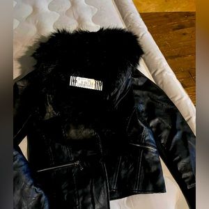 Woman’s leather jacket with fur